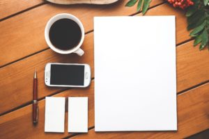 Phone and white paper