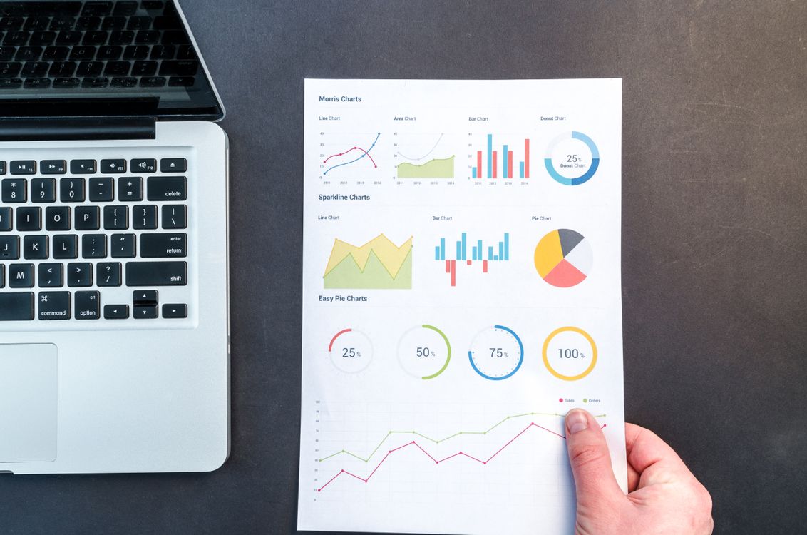 Free Person Holding Chart And Bar Graph Stock Photo