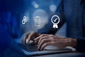 Person typing on a laptop with icons representing process automation, checklists, and quality certification