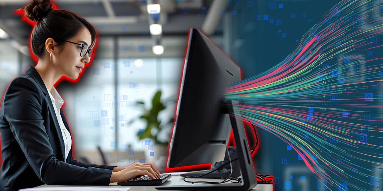 Girl with a glasses using a PC
